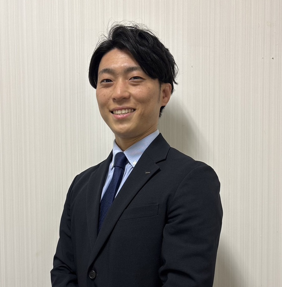 市川店店長   本間