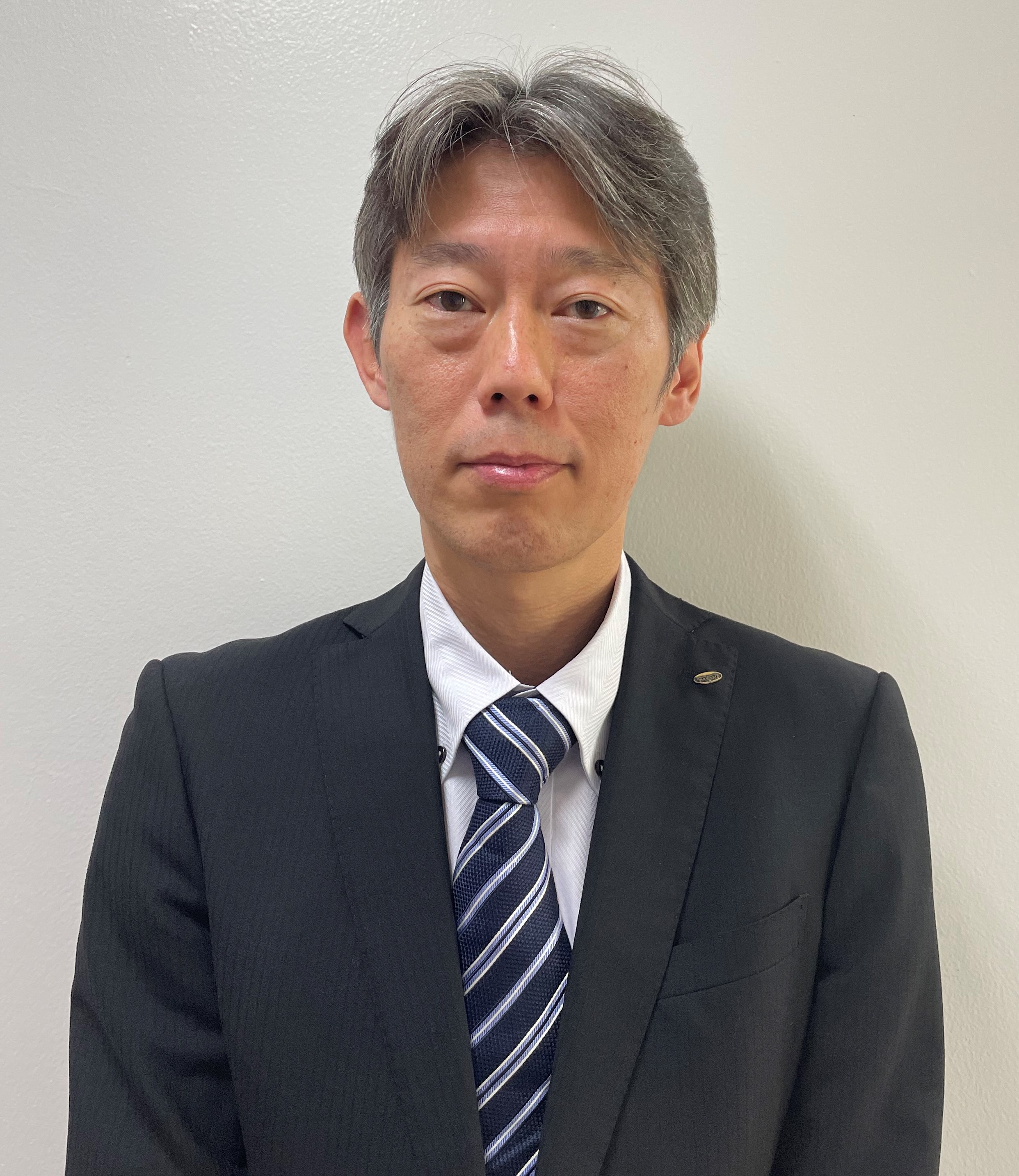 用賀店 店長・四家